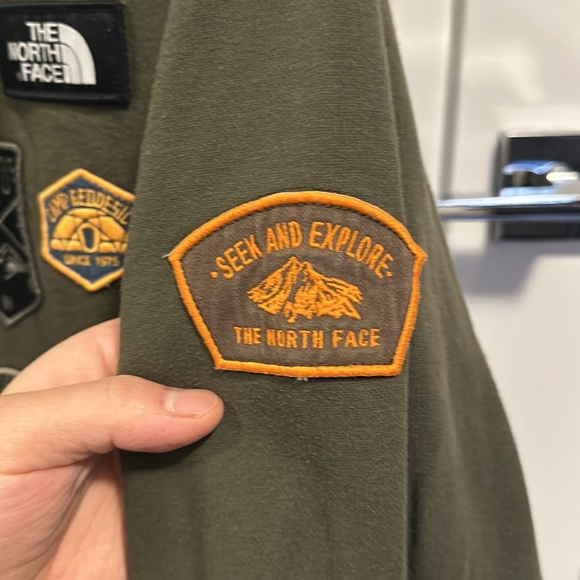 The NorthFace Jacket with logos on the front and back - Picture 3 of 4